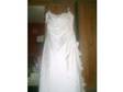 Strapless Ivory Wedding Dress size 14. This wedding was....